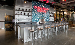 Concrete bar top in a Coney Island eatery with industrial aesthetics.